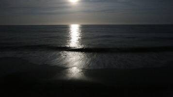 On the beach, sun loungers