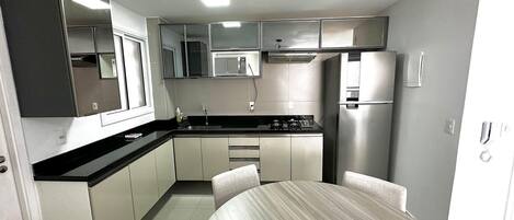 Apartment | Private kitchen | Fridge, microwave, coffee/tea maker, cookware/dishes/utensils