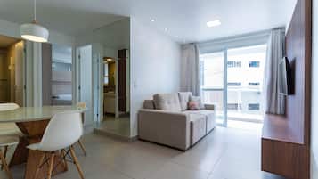 Apartamento conforto | Área de estar | Pebolim