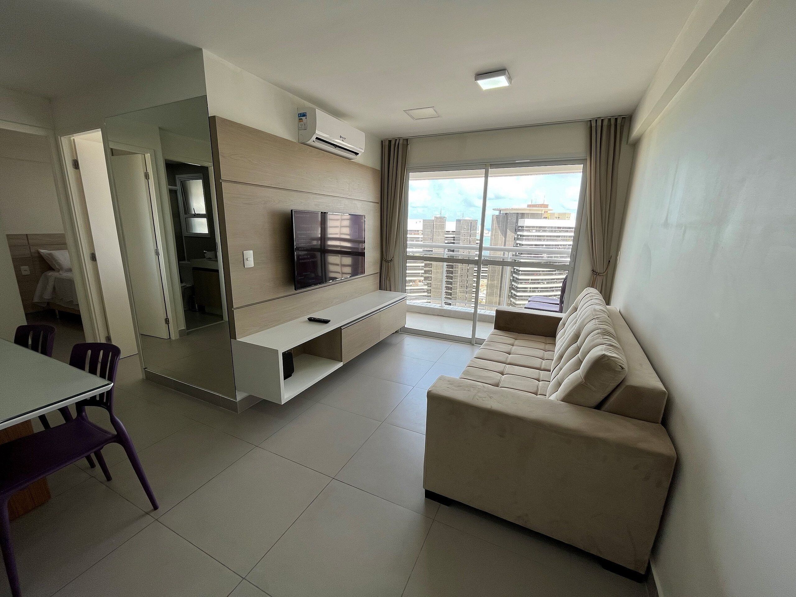Apartamento Confort | Zona de estar | Un futbolín