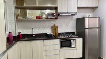 Apartment | Private kitchen | Coffee/tea maker, fridge, microwave, cookware/dishes/utensils