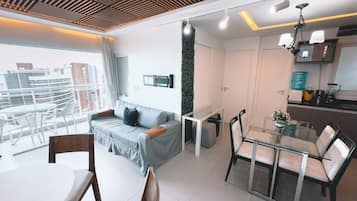 Elite Apartment, 2 Bedrooms, Partial Ocean View | Living area | Foosball
