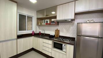 Apartment | Private kitchen | Coffee/tea maker, fridge, microwave, cookware/dishes/utensils