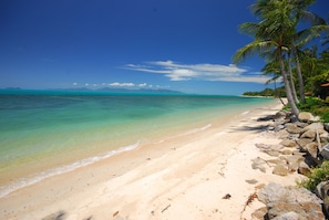 On the beach, sun-loungers, beach towels
