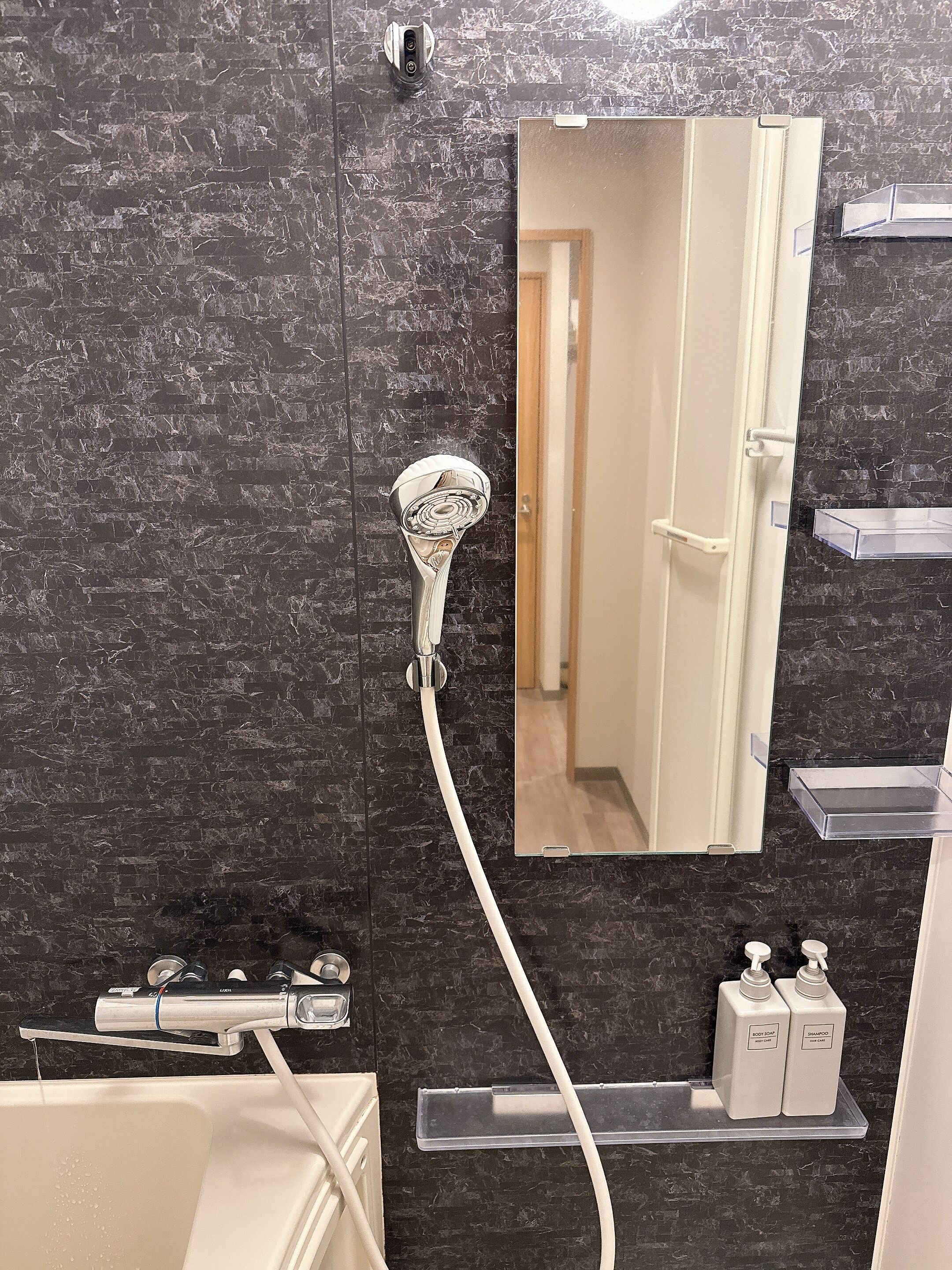Hair dryer, slippers, bidet, towels