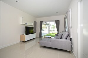 Luxury Villa | Living area | Flat-screen TV