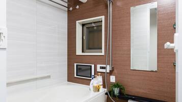 Apartment | Bathroom | Separate tub and shower, free toiletries, hair dryer, electronic bidet