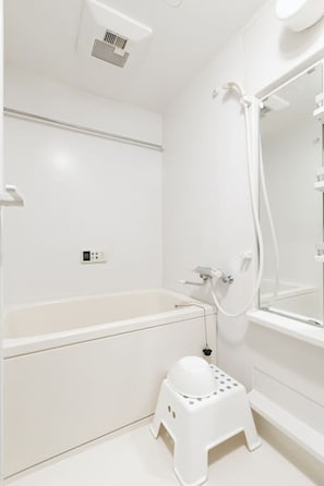 Apartment | Bathroom | Separate tub and shower, free toiletries, hair dryer, electronic bidet
