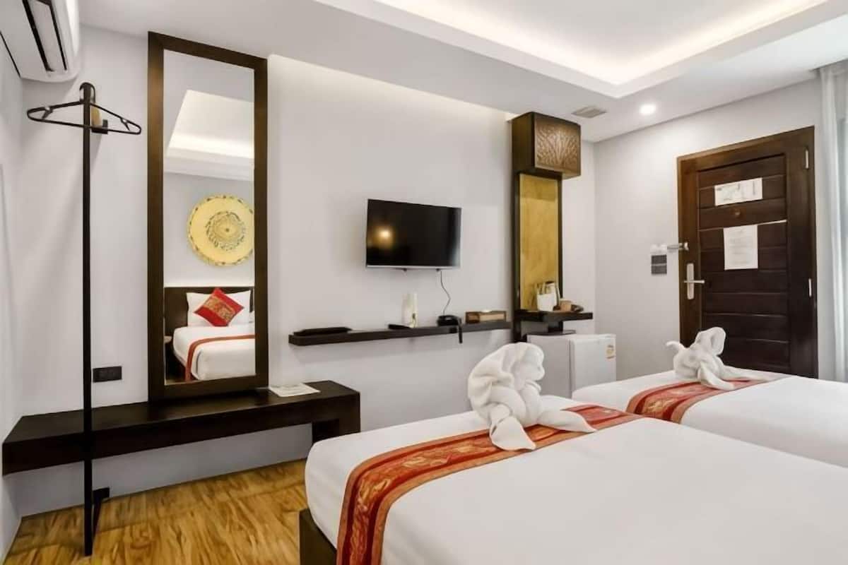 Ropa de cama hipoalergénica, artículos del minibar gratis y wifi gratis