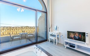Télévision à écran plat, chauffage par le sol