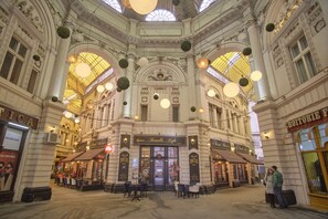 A historic building with ornate architecture, including columns and decorative moldings.