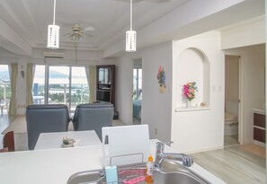 Family Apartment, Ocean View (Upper Floor) | Private kitchenette | Fridge, microwave, stovetop, electric kettle - Ocean Front Yamakawa (Motobu)