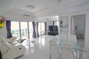 Superior Apartment, Ocean View | Living area | Flat-screen TV - Ocean Front Yamakawa (Motobu)