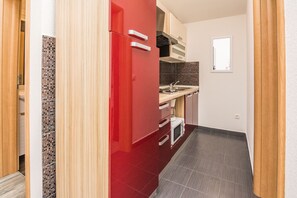 Apartment, 1 Bedroom (A3) | Private kitchen | Full-size fridge, microwave, stovetop, coffee/tea maker - Apartments Galic (Vir)