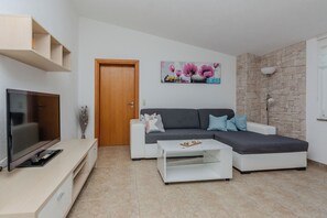 Apartment, Sea View (A3) | Living area | Flat-screen TV - Apartments Tukara (Vir)