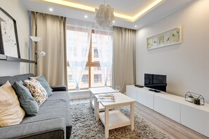 Appartement (124 A) | Salle de séjour | Téléviseur à écran plat