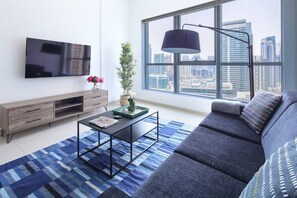 Premier Apartment, 1 Bedroom | Living area | 40-inch Smart TV with cable channels, TV - Frank Porter Bay Central 1 (Dubai)