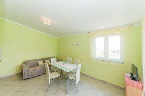 Apartment, Sea View (A1) | Living area | Flat-screen TV - Apartments Jambreus (Vir)