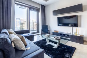 Premium Apartment | Living area | 40-inch Smart TV with digital channels, TV - Frank Porter Sparkle Tower (Dubai)