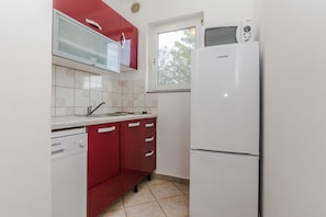 Apartment, 2 Bedrooms A1 | Eget kjøkken | Kjøleskap, mikrobølgeovn, kokeplater og oppvaskmaskin