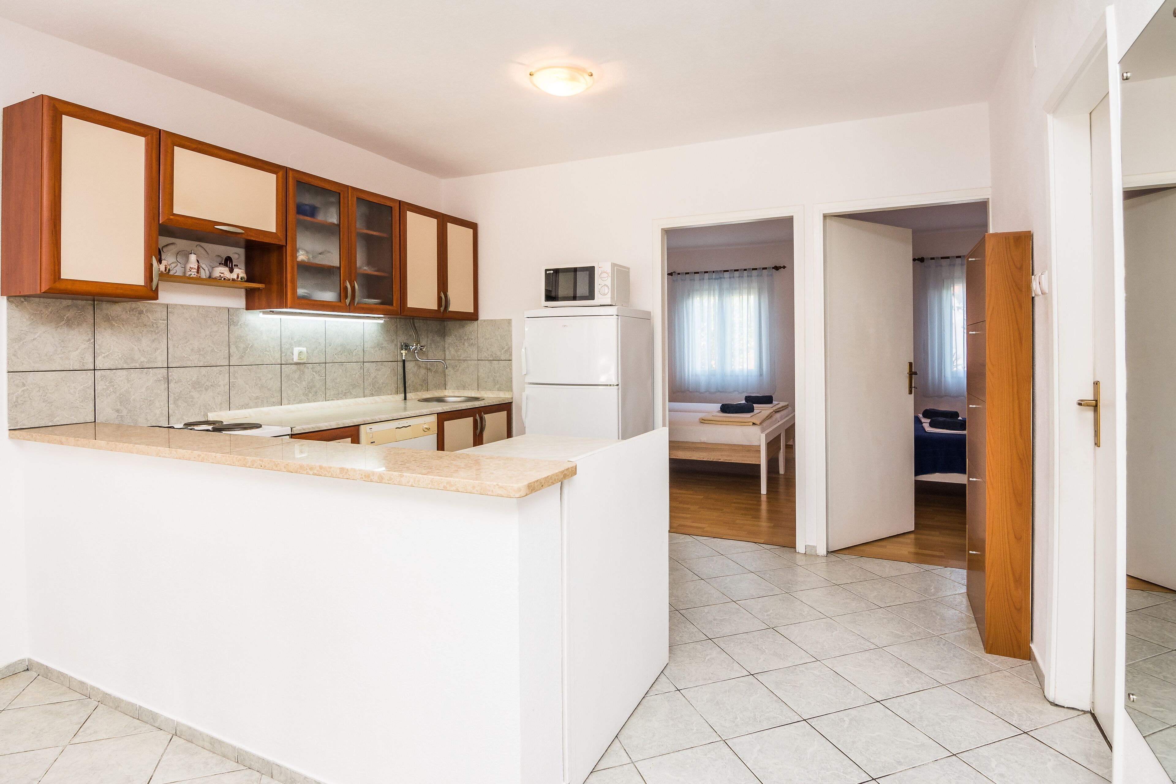Apartment, 2 Bedrooms A1 | Private kitchen | Fridge, microwave, oven, stovetop
