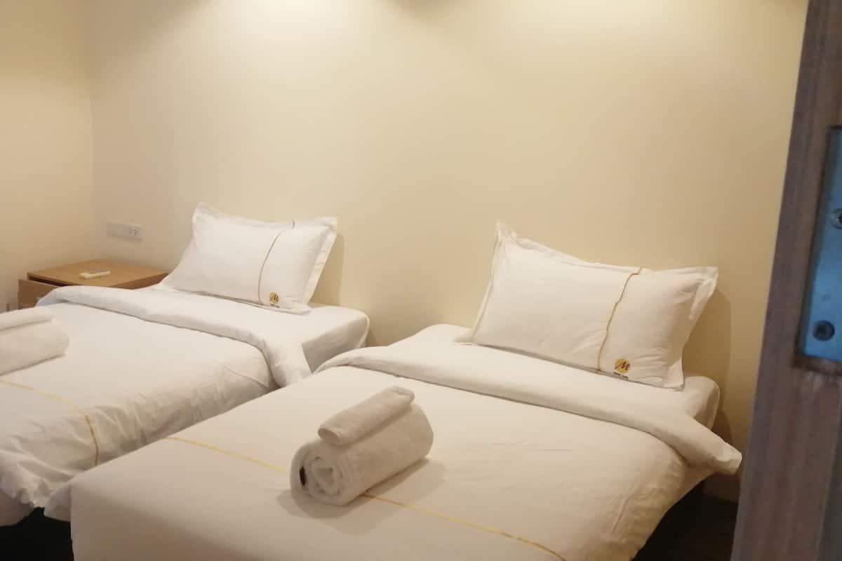 Studio suite, 2 eenpersoonsbedden | Luxe beddengoed, donsdekens, pillowtop-bedden, een bureau