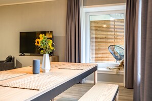 Appartement, 1 chambre | Coin séjour | Télévision à écran plat