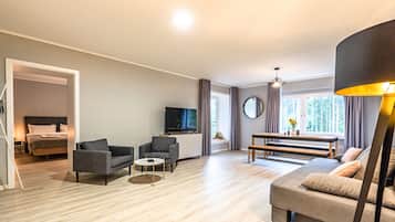 Apartment, 1 Bedroom | Living area | Flat-screen TV