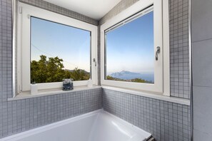 Villa, 2 Bedrooms | Bathroom | Combined shower/bathtub, jetted bath, rainfall showerhead, hair dryer - Villa Felice (Massa Lubrense)