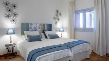 8 chambres, coffres-forts dans les chambres, fer et planche Ă repasser