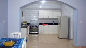 Apartment, 1 Bedroom, River View | Private kitchen | Stovetop, coffee/tea maker, electric kettle, cookware/dishes/utensils
