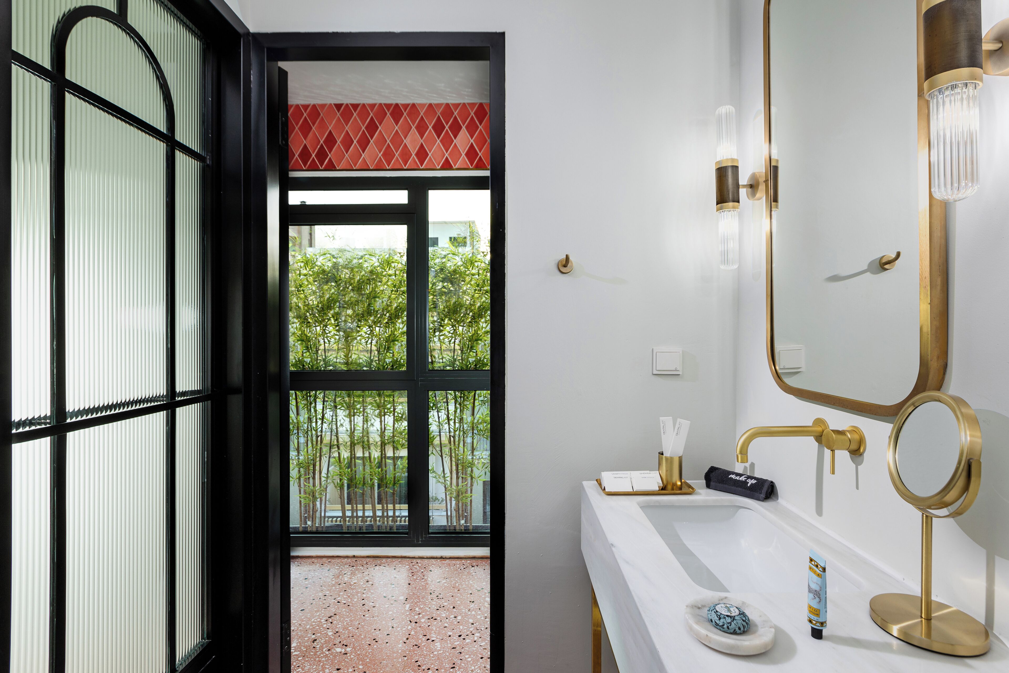 signature suite | bathroom | free toiletries, hair dryer, bathrobes, slippers