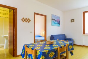 Apartment, 1 Bedroom (n.8) | Living area | LCD TV - Appartamenti La Baia Lido (Portoferraio)