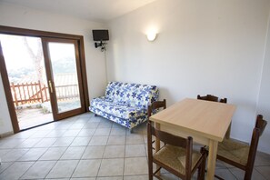 Apartment, 1 Schlafzimmer | Essbereich im Zimmer