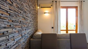 Apartment, 2 Bedrooms | Living area | LCD TV