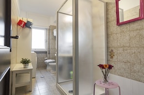 Apartment, 2 Bedrooms | Bathroom | Shower, free toiletries, hair dryer, towels
