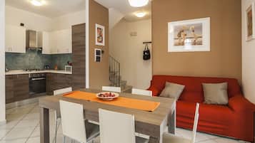 Apartment, 4 Bedrooms | Living area | LCD TV