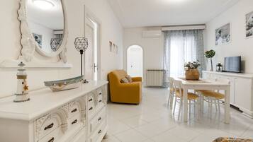 Apartment, 2 Bedrooms | Living area | LCD TV