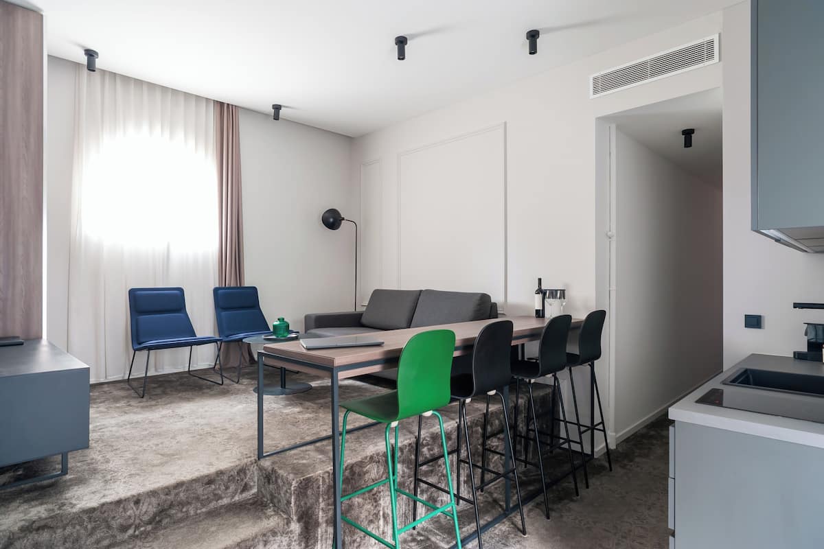 Superior Suite | Living area | Flat-screen TV