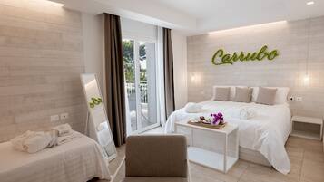 Premium bedding, down comforters, memory foam beds, minibar