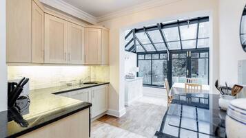 Luxury Apartment | Private kitchen | Full-size fridge, microwave, oven, stovetop