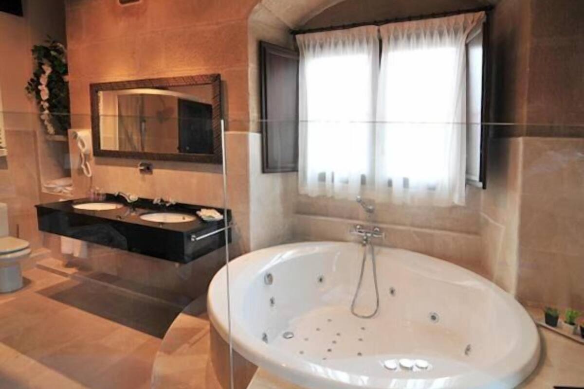 hair dryer, bidet, towels, soap