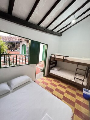 Economy Double Room | Blackout curtains, iron/ironing board, free WiFi, bed sheets