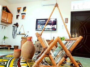 Studio (African Loft) | Living area | 49-inch flat-screen TV with digital channels, TV, Netflix