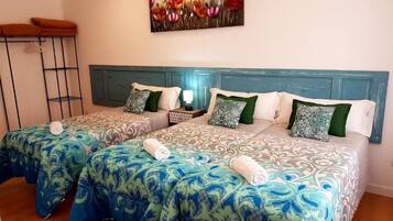 Family Room, Shared Bathroom | Desk, free WiFi, bed sheets