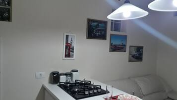 Traditional Studio Suite | Private kitchenette | Full-size fridge, microwave, stovetop, coffee/tea maker