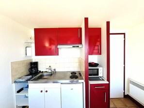 Fridge, microwave, cookware/dishes/utensils