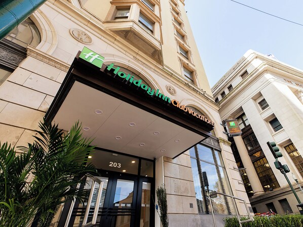 A hotel entrance with a sign for 'Holiday Inn Club Vacations' and the number '203' above the door. - Holiday Inn Club Vacations New Orleans Resort by IHG (New Orleans)