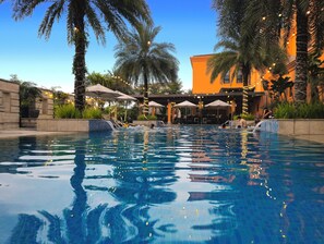 Outdoor pool, open 6:00 AM to 10:00 PM, sun loungers