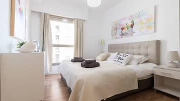 1 bedroom, desk, iron/ironing board, travel crib